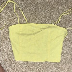 Yellow crop top with straps that tie